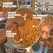 Cheese popcorn being made with a unique seasoning blend, no powdery fingers, real cheddar cheese